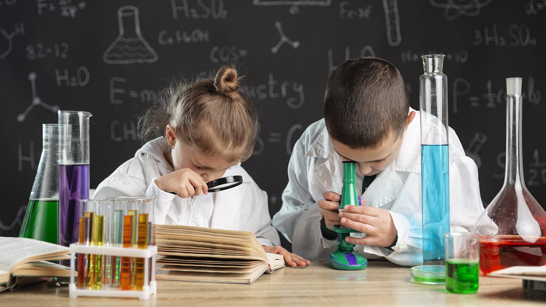 web children doing experiments laboratory